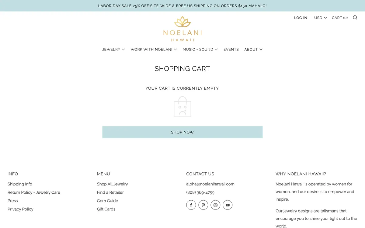 The empty cart page on desktop with the popup dismissed, showing the header, a heading and a message that the cart is empty, on a large area of pale grey background.