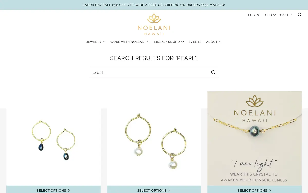 Search results for the term pearl on desktop with the popup dismissed, showing a grid of pearl jewellery product images each with a pale blue Select Options button, with no result count, filters or sort control visible.
